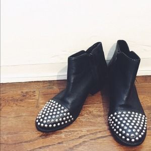 Black leather studded Steve Madden ankle boots.