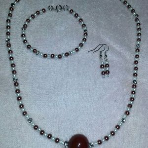 Necklace, bracelet, and earring set