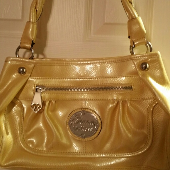Yellow purse. Huge inside. Cute & elegant