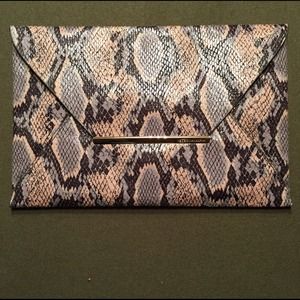 Bcbg Snake skin clutch