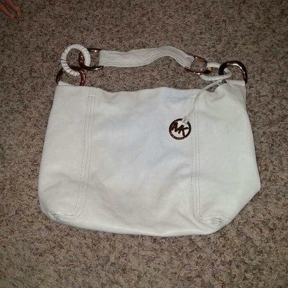 MK tan purse