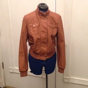 Tan leather jacket from Saks fifth Ave