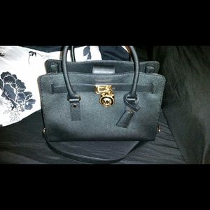 Mk bag cost me $ 298 more taxas