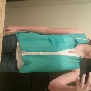 Sleeveless /see through teal top. NWOT