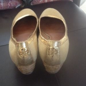 Tory Burch gold and tan wedges.