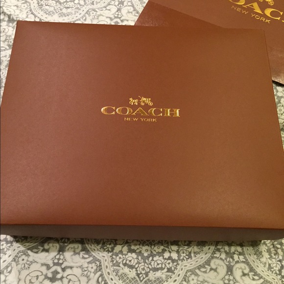 Large brown coach box w/ bag