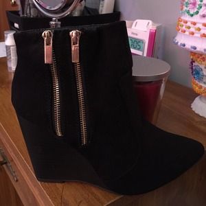 Justfab black wedges with gold zippers.