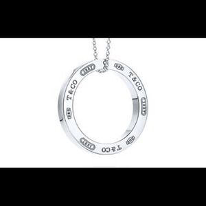 Tiffany & Co Circle pendant authentic &small pouch