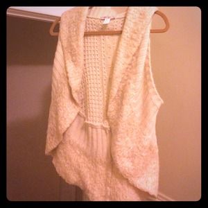 Fur vest looks smaller than appears in picture