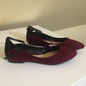 Burgundy and black flats