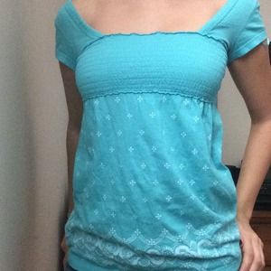 Off shoulder teal shirt