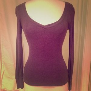 Purple long sleeved top with subtle design