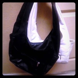 2 leather purses one black one white