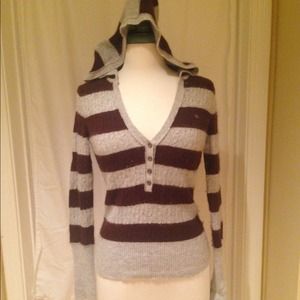 Cozy grey and brown striped sweater with hood