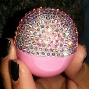 EOS lip balm top completely embellished.