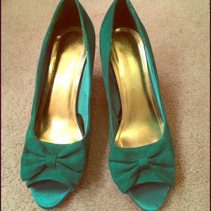 Green suede peep toe heels