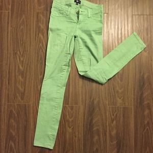 Pale green skinny pants