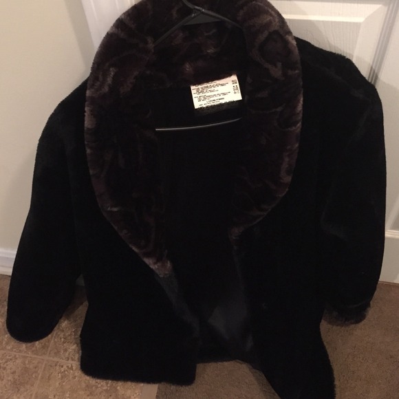 Black fur like winter jacket