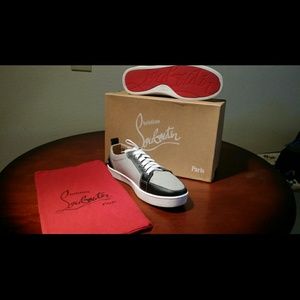 Womens Christian louboutin sneaker.