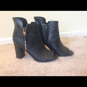 Peep toe, heeled booties.