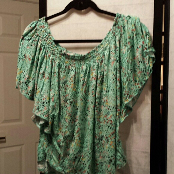 Top with flutter sleeves