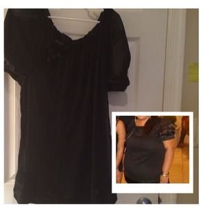 Sheer black top with puff sleeves