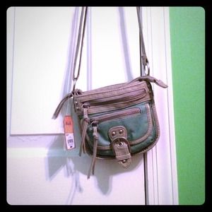 BRAND NEW. Little blue and tan satchel