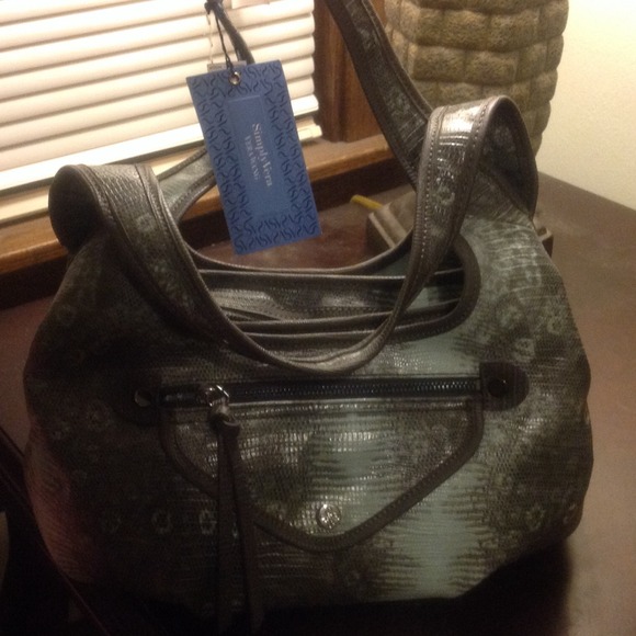 Brand new never worn. Vera wang handbag