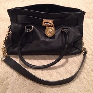 Michael kors black & gold medium size purse