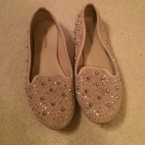studded pale pink flats