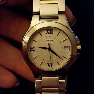 Men's Coach watch, light wear.