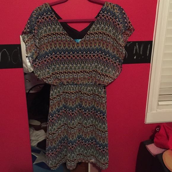 Peacock colored dress