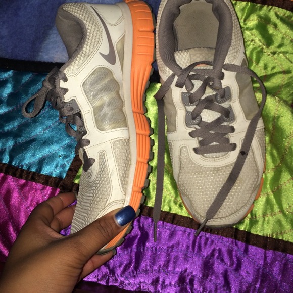 Orang and grey nike running shoes!