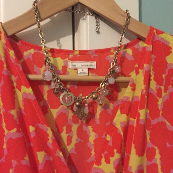 Crossover animal print dress.