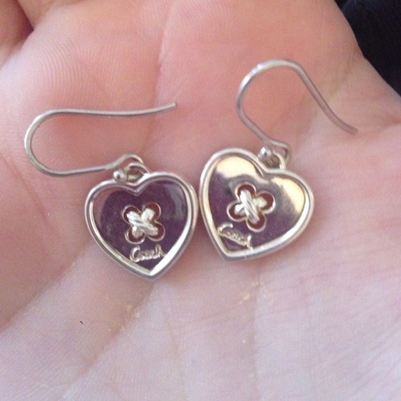 Heart shaped coach button earrings