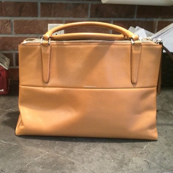 Gently used and loved coach borough bag