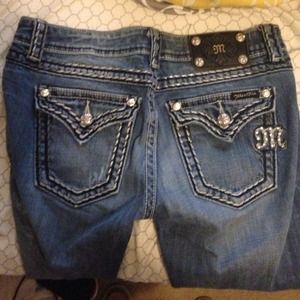 Miss me jeans. I just grew out of them. Size 27.