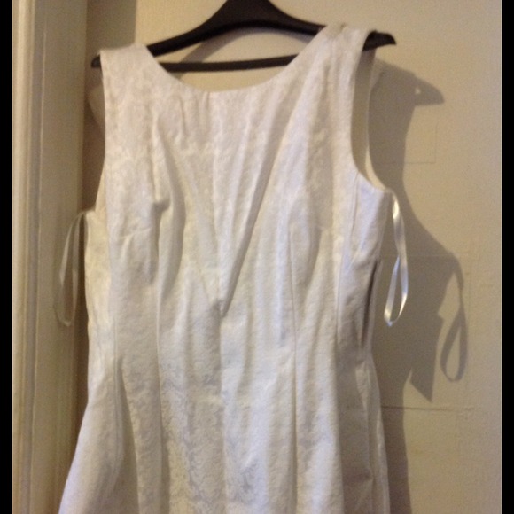 White A line dress with baroque inspired design