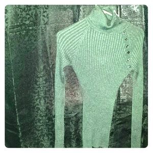 A Long Sleeve turtle neck sweater dress.