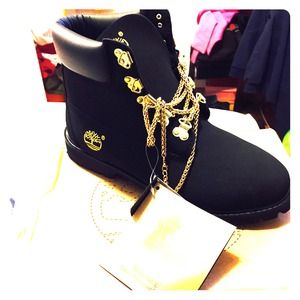 black timbs with gold chains