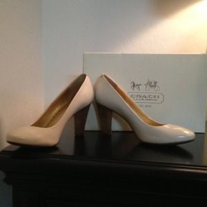 Authentic White coach shoes with a wooden heel