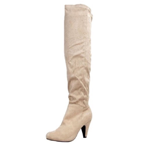 Long faux suede taupe colored stretch boots.