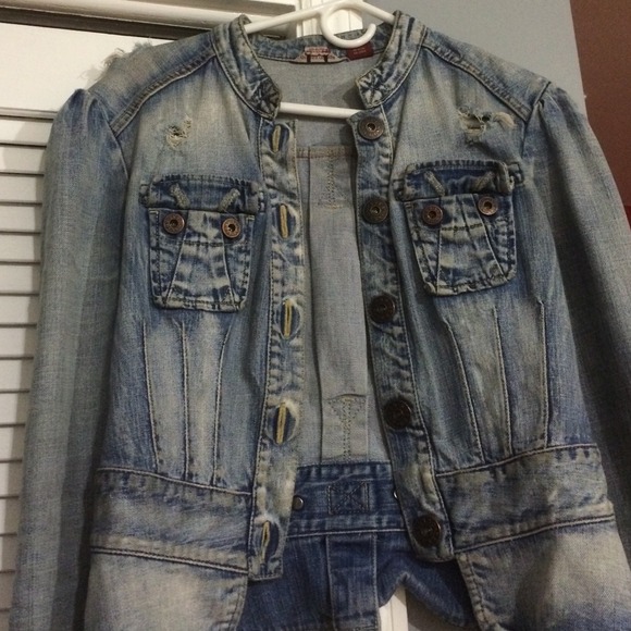 Jean jacket with rips