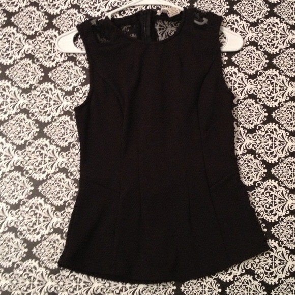Black sleeveless peplum top. SORRY, NO TRADES.