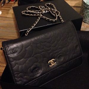 CHANEL's classic Camellia leather handbag.