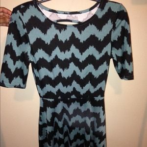 Green and black dress with cut out back