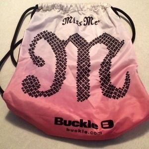 Miss Me and a Rock Revival bag