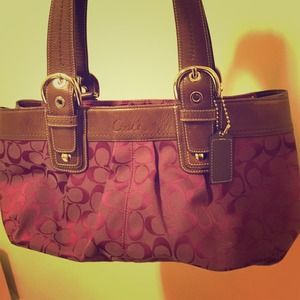 Gently used purple Coach bag