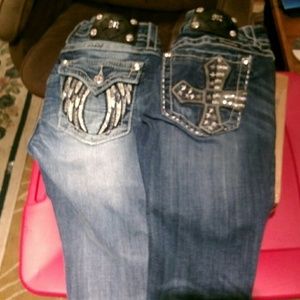 Two pairs of Miss Me boot cut jeans