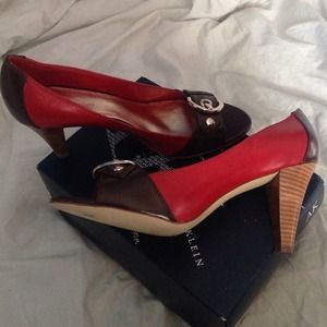 Red peep toe pumps with front buckle detail!!